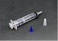 Medical syringe with a blue cap and white plunger on a gray background