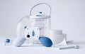 Set of medical equipment including a pump, bottles, and other components on a light gray background